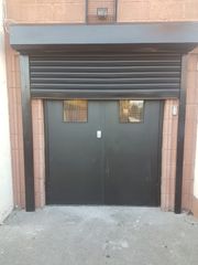 double steel door with motorised shutter